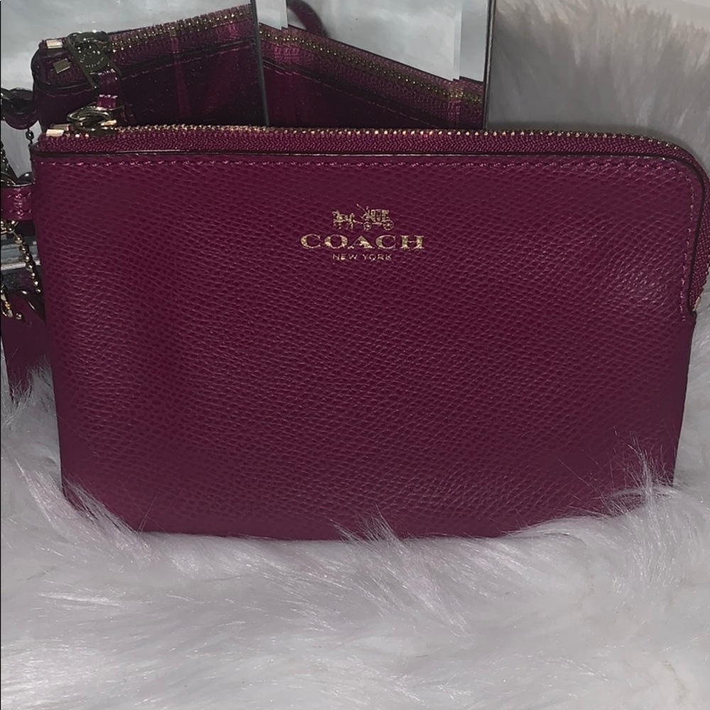 Purple coach wristlet